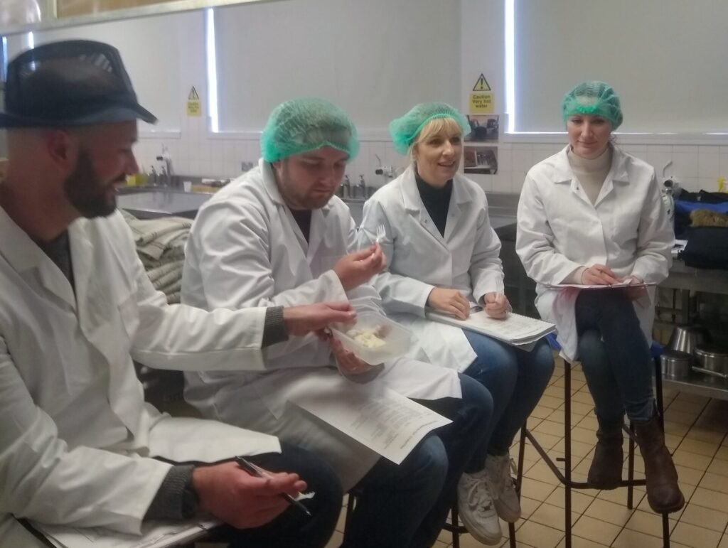 Students assessing fish on a training course